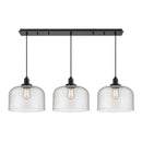 Bell Linear Pendant shown in the Matte Black finish with a Seedy shade