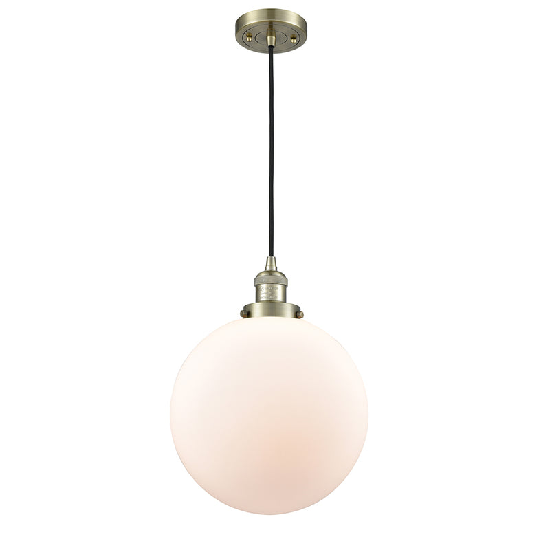 Beacon Mini Pendant shown in the Antique Brass finish with a Matte White shade