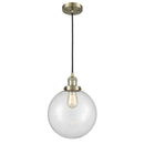 Beacon Mini Pendant shown in the Antique Brass finish with a Clear shade