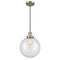 Beacon Mini Pendant shown in the Antique Brass finish with a Clear shade