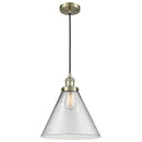 Cone Mini Pendant shown in the Antique Brass finish with a Clear shade