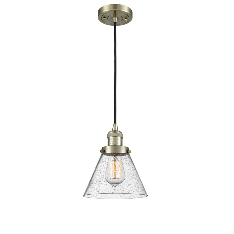 Cone Mini Pendant shown in the Antique Brass finish with a Seedy shade