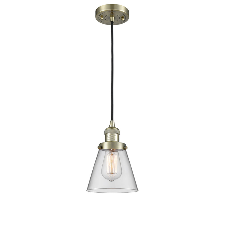 Cone Mini Pendant shown in the Antique Brass finish with a Clear shade