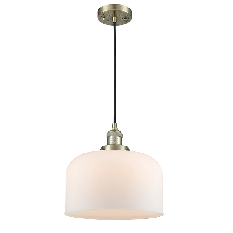 Bell Mini Pendant shown in the Antique Brass finish with a Matte White shade