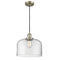 Bell Mini Pendant shown in the Antique Brass finish with a Clear shade