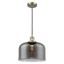 Bell Mini Pendant shown in the Antique Brass finish with a Plated Smoke shade