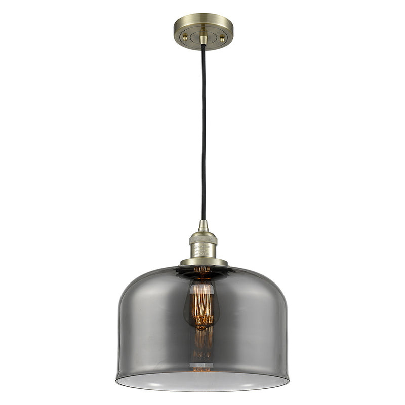 Bell Mini Pendant shown in the Antique Brass finish with a Plated Smoke shade