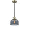 Bell Mini Pendant shown in the Antique Brass finish with a Plated Smoke shade