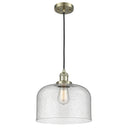 Bell Mini Pendant shown in the Antique Brass finish with a Seedy shade