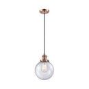 Beacon Mini Pendant shown in the Antique Copper finish with a Seedy shade