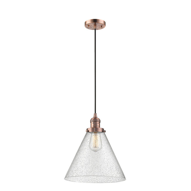 Cone Mini Pendant shown in the Antique Copper finish with a Seedy shade