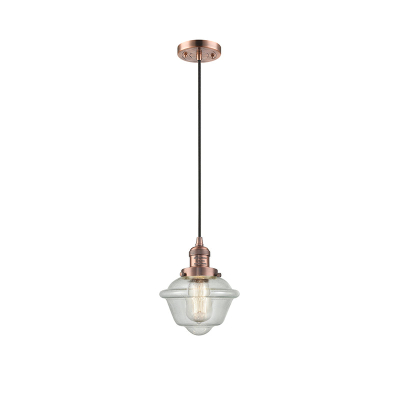 Oxford Mini Pendant shown in the Antique Copper finish with a Seedy shade