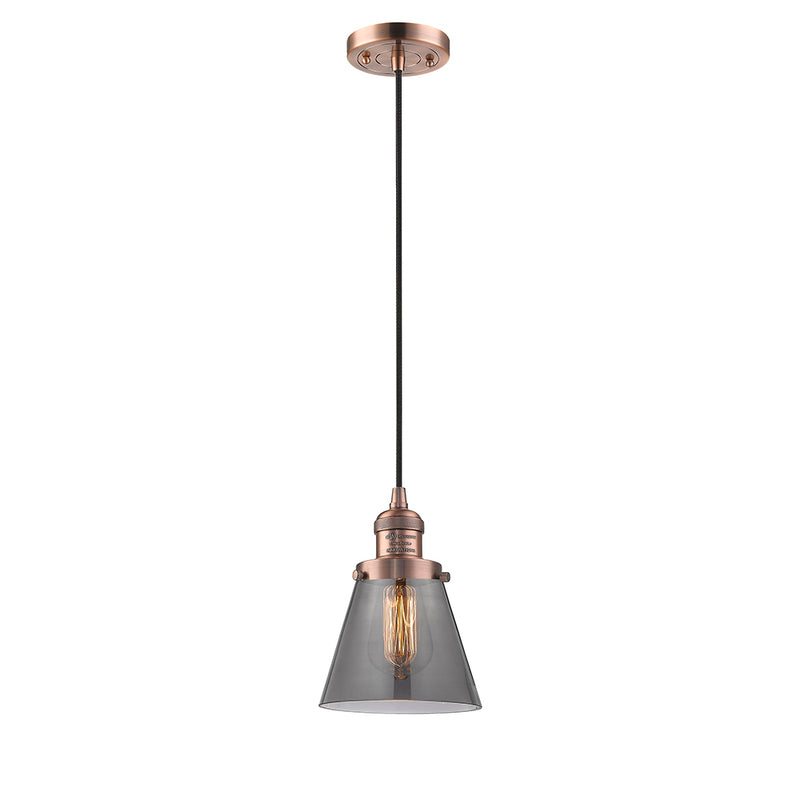 Cone Mini Pendant shown in the Antique Copper finish with a Plated Smoke shade