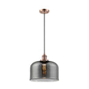 Bell Mini Pendant shown in the Antique Copper finish with a Plated Smoke shade