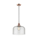 Bell Mini Pendant shown in the Antique Copper finish with a Seedy shade