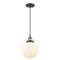 Beacon Mini Pendant shown in the Black Antique Brass finish with a Matte White shade