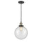 Beacon Mini Pendant shown in the Black Antique Brass finish with a Seedy shade