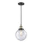 Beacon Mini Pendant shown in the Black Antique Brass finish with a Seedy shade