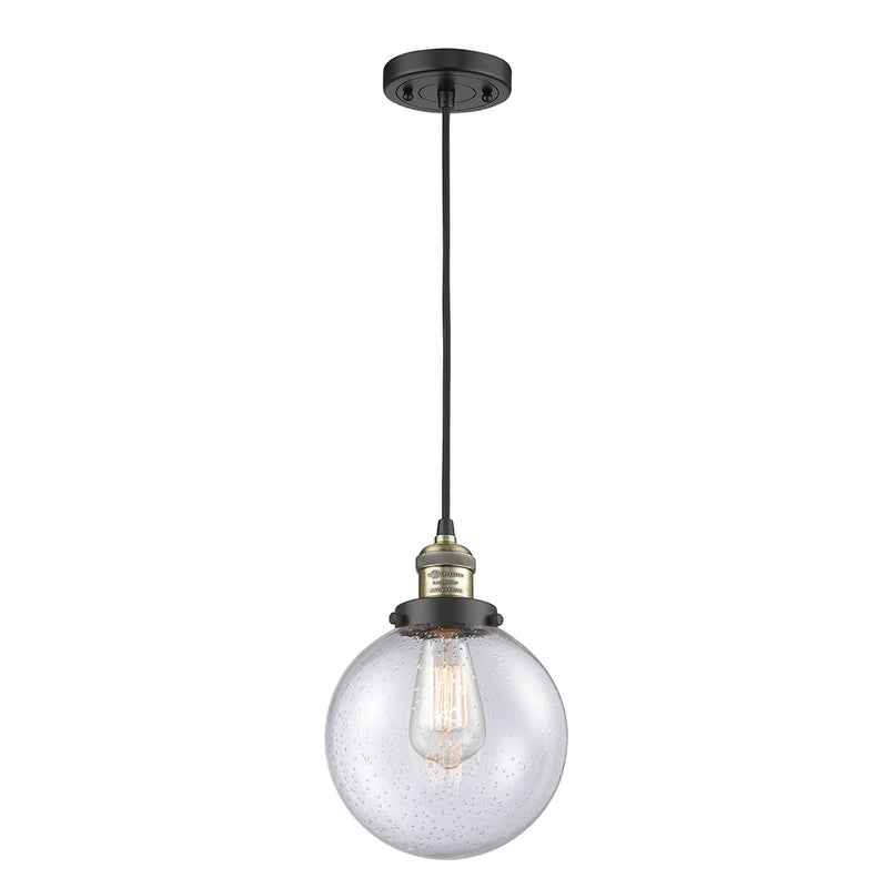 Beacon Mini Pendant shown in the Black Antique Brass finish with a Seedy shade