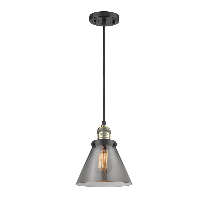 Cone Mini Pendant shown in the Black Antique Brass finish with a Plated Smoke shade