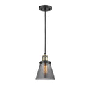 Cone Mini Pendant shown in the Black Antique Brass finish with a Plated Smoke shade