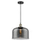 Bell Mini Pendant shown in the Black Antique Brass finish with a Plated Smoke shade