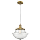 Oxford Mini Pendant shown in the Brushed Brass finish with a Seedy shade