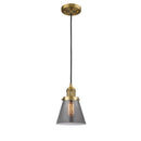 Cone Mini Pendant shown in the Brushed Brass finish with a Plated Smoke shade