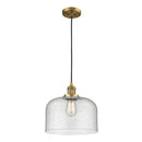 Bell Mini Pendant shown in the Brushed Brass finish with a Seedy shade