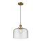 Bell Mini Pendant shown in the Brushed Brass finish with a Seedy shade