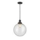 Beacon Mini Pendant shown in the Matte Black finish with a Seedy shade