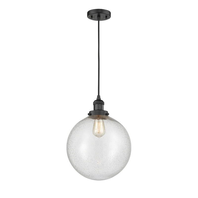 Beacon Mini Pendant shown in the Matte Black finish with a Seedy shade