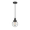 Beacon Mini Pendant shown in the Matte Black finish with a Seedy shade