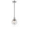 Beacon Mini Pendant shown in the Polished Nickel finish with a Seedy shade