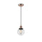 Beacon Mini Pendant shown in the Antique Copper finish with a Seedy shade