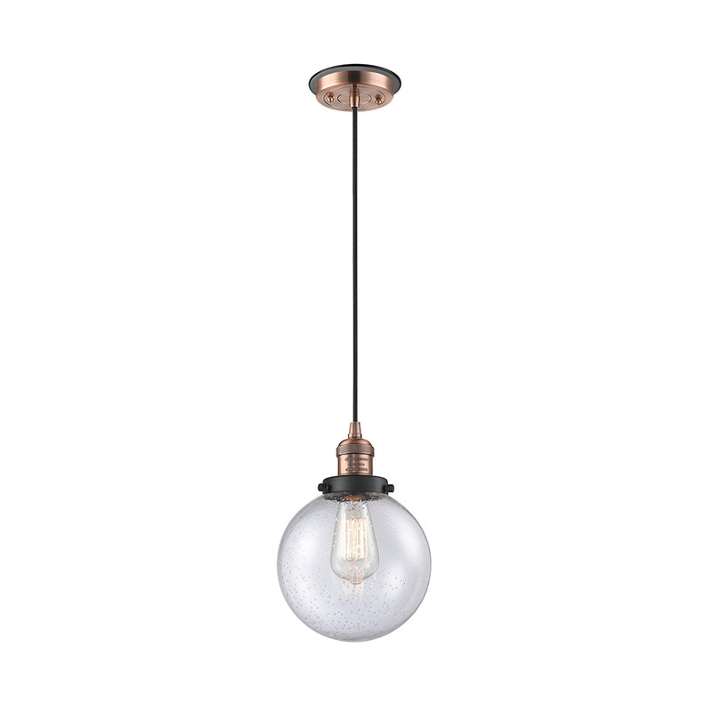 Beacon Mini Pendant shown in the Antique Copper finish with a Seedy shade