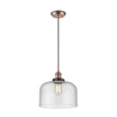 Bell Mini Pendant shown in the Antique Copper finish with a Seedy shade