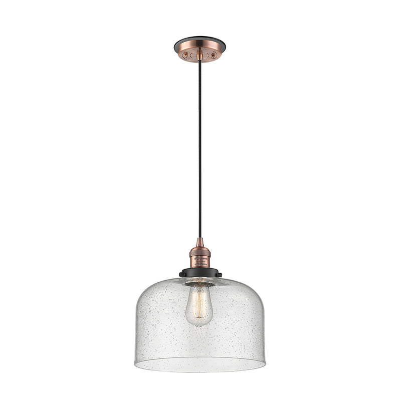 Bell Mini Pendant shown in the Antique Copper finish with a Seedy shade