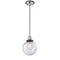 Beacon Mini Pendant shown in the Polished Nickel finish with a Seedy shade