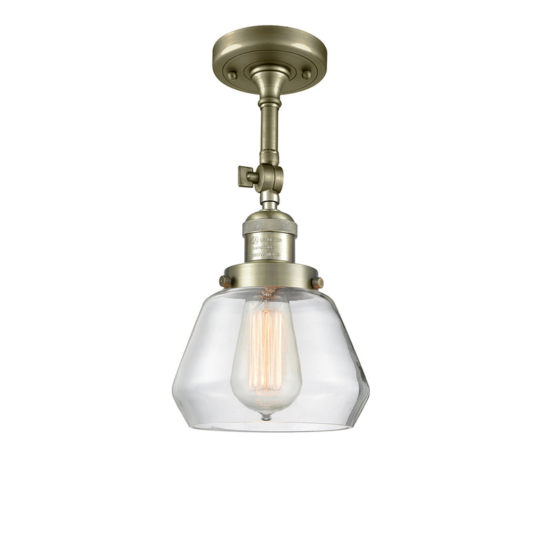 Fulton Semi-Flush Mount shown in the Antique Brass finish with a Clear shade