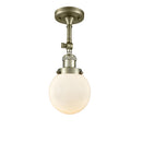 Beacon Semi-Flush Mount shown in the Antique Brass finish with a Matte White shade