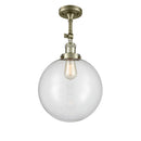 Beacon Semi-Flush Mount shown in the Antique Brass finish with a Clear shade