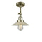 Halophane Semi-Flush Mount shown in the Antique Brass finish with a Clear Halophane shade