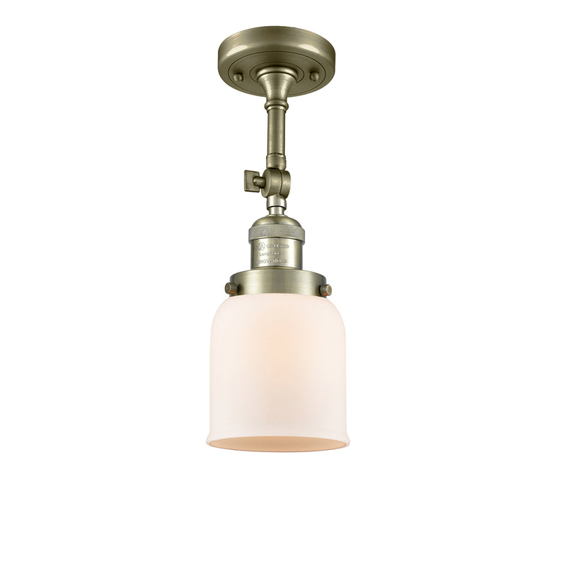 Bell Semi-Flush Mount shown in the Antique Brass finish with a Matte White shade