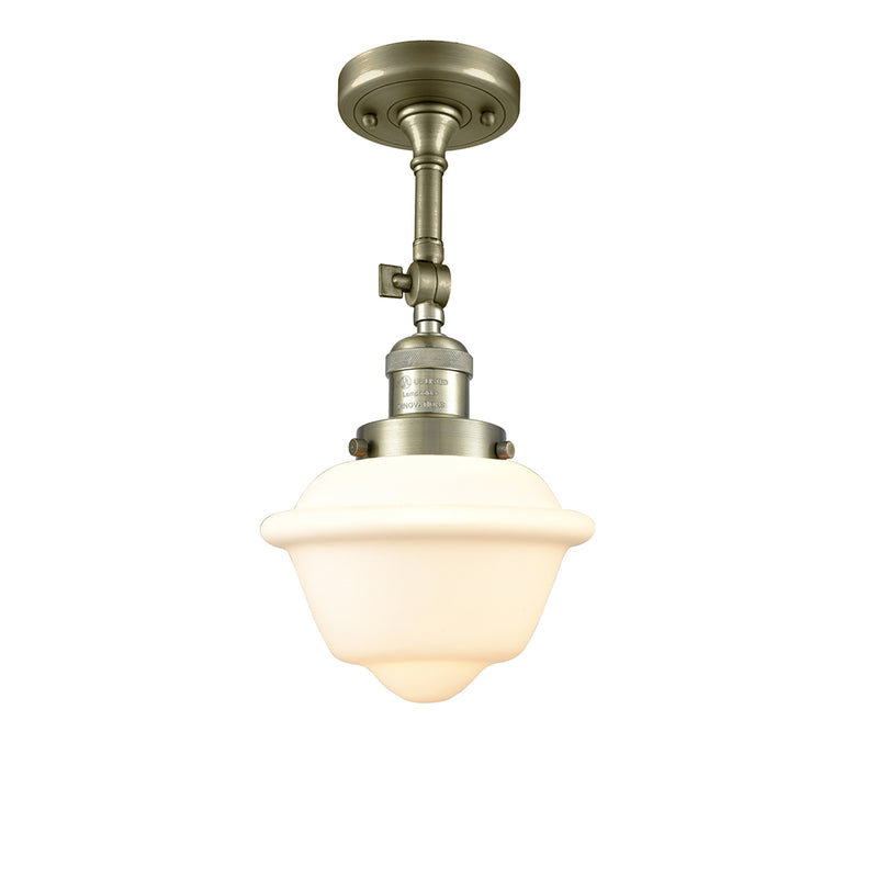 Oxford Semi-Flush Mount shown in the Antique Brass finish with a Matte White shade