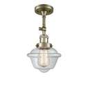 Oxford Semi-Flush Mount shown in the Antique Brass finish with a Clear shade