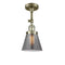 Cone Semi-Flush Mount shown in the Antique Brass finish with a Plated Smoke shade