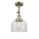 Bell Semi-Flush Mount shown in the Antique Brass finish with a Clear shade