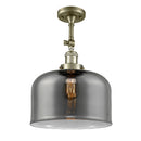 Bell Semi-Flush Mount shown in the Antique Brass finish with a Plated Smoke shade