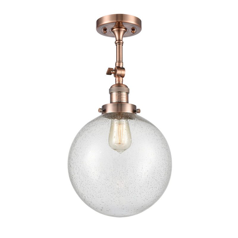 Beacon Semi-Flush Mount shown in the Antique Copper finish with a Seedy shade